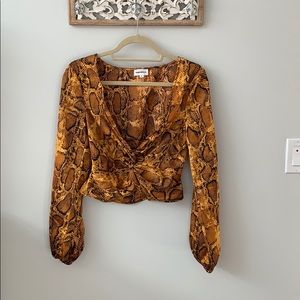 Super down snakeskin blouse